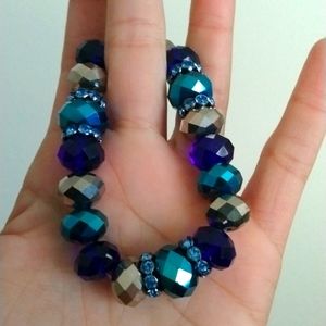 Vintage elastic bracelet beautiful shiny shades of blue with gemstone accents